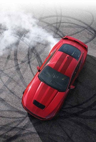 Overhead view of a 2024 Ford Mustang® model with tire tracks on pavement | White Ford Lincoln, L.L.C. in Winnsboro LA